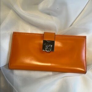 Salvatore Ferragamo Orange Leather Wallet with Silver Clasp
